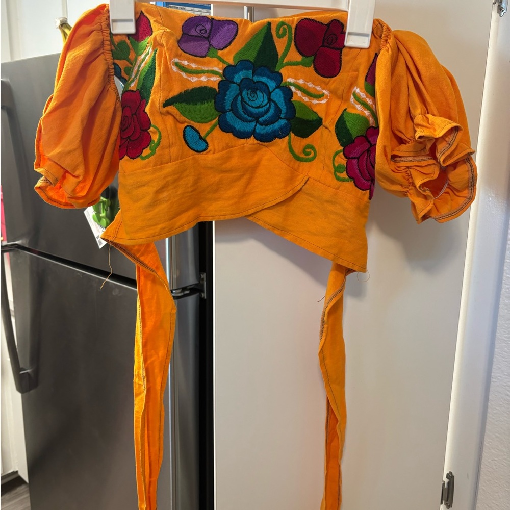 Yellow flowered, Mexican style peasant, top that wraps in back
